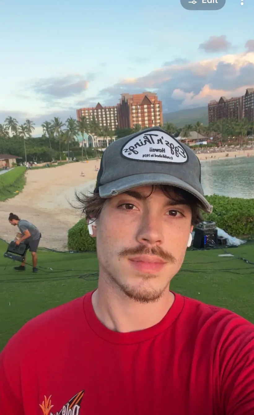Hunter at the beach in Oahu at dusk.